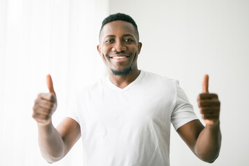 black man confident and casual at home. Portrait or headshot of a young men