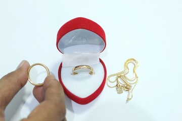 Beautiful gold jewelry. Gold jewelry on a white background.