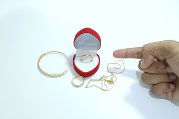 Beautiful gold jewelry. Gold jewelry on a white background.
