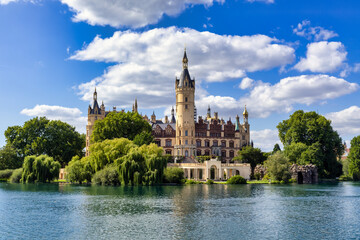 Beautiful Fabulous Kingly Palace Surrounded by Green Trees and Calm Water