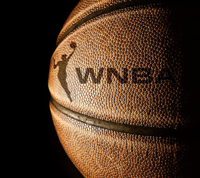 Raleigh, NC - USA - 04-15-2024:  WNBA logo basketball with black copyspace