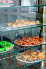 Traditional Spanish and Arabic sweets in shop display. Tarifa. Spain. September 2025.