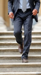 A man dressed in business casual attire walks up stairs, wearing leather shoes and holding something in his hands