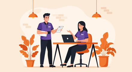 Two colleagues in purple shirts discussing a document at a desk with a laptop.