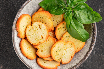 Crisps croutons with greens croutons delicious snack fresh delicious gourmet food background on the...