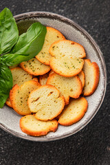 Crisps croutons with greens croutons delicious snack fresh delicious gourmet food background on the...