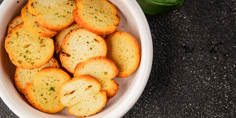 Crisps croutons with greens croutons delicious snack fresh delicious gourmet food background on the...