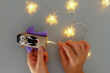 Handmade Dracula figure from cardboard roll DIY tutorial with led garland and paper cutouts....