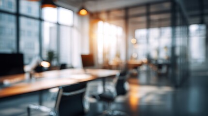 Abstract blurred modern office interior in morning light professional business presentation background of a contemporary workplace environment.