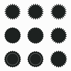 a collection of twelve hand-drawn black brush stroke shapes 