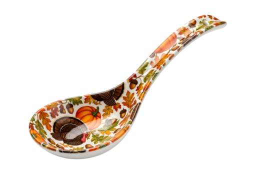 Thanksgiving themed ceramic spoon isolated on transparent background featuring turkeys and pumpkins
