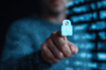 Human finger touches glowing digital padlock representing cybersecurity protection interface.