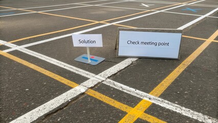 Signs Indicating Location for Meeting Points in a Parking Area