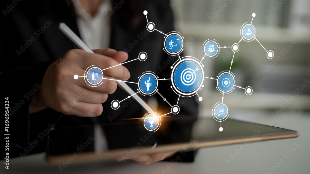 Poster a business professional engages with a tablet, surrounded by various interactive icons representing 