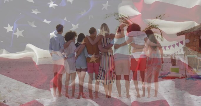 Leaning friends placing arms around shoulders on sandy shoreline, with hut bunting flags cushions - Powered by Adobe