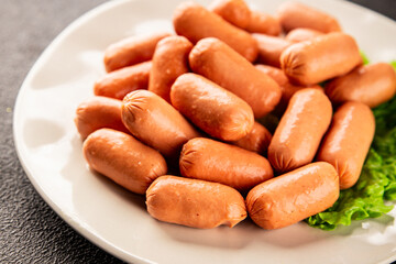 Mini sausages fresh delicious processed meat tasty snack fresh delicious gourmet food background on...
