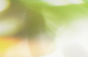 Abstract textured background with vibrant green yellow and grey tones evoking nature and organic...