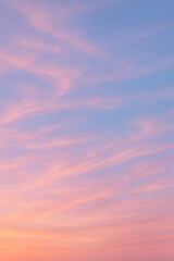 Obraz premium Beautiful pastel sky with soft clouds at sunset