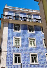 characteristic building of Lisbon, Portugal, recognizable by its facade decorated with azulejos, the typical glazed and decorated ceramic tiles, a distinctive element of Portuguese architecture