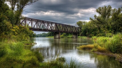 Rusty metal bridge over a calm river