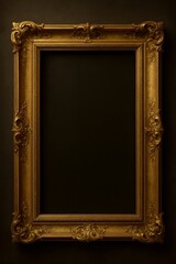 Empty golden ornate picture frame on dark background