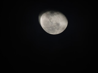 Detailed view of the waxing gibbous Moon against a black sky, showing craters and maria. A sharp, high-contrast astronomical capture.