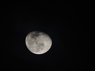 Detailed view of the waxing gibbous Moon against a black sky, showing craters and maria. A sharp, high-contrast astronomical capture.