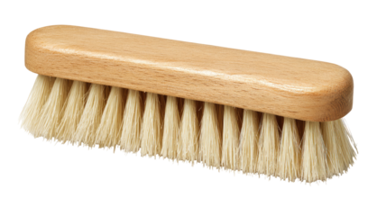 A light beige-colored cleaning brush with a light-tan wooden handle
