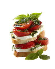 Layers of toasted bread, fresh mozzarella, juicy tomatoes, and basil