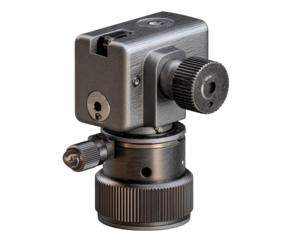 Precision mechanical device, likely a targeting or optical system.  Gray metal housing, multiple adjustments