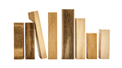 Wooden blocks of varying heights and shades,  some leaning