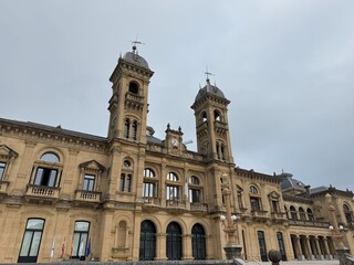 San Sebastian City Hall historic building with ornate architecture, photographed on August 16, 2025, under a summer sky in Donostia, Basque Country, Spain