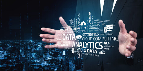 A professional businessman stands confidently with outstretched hands, presenting key concepts of digital analytics and data in a modern technology-driven environment. Tessel