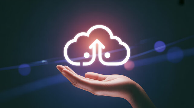 Cloud Computing at Your Fingertips: A minimalist image showcasing a hand delicately cradling a glowing cloud icon, symbolizing seamless access to digital information and connectivity.