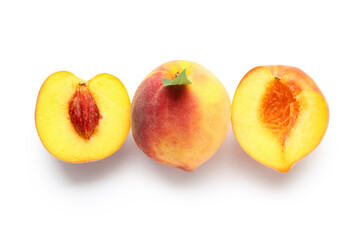 Sweet ripe peaches on white background