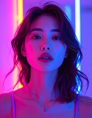 Portrait of a woman in vibrant neon light