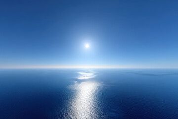 Obraz premium aerial view mesmerizing surface of ocean glistening under radiant sunlight