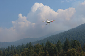 drone equipped with advanced thermal imaging technology detects fire hotspots in dense forest