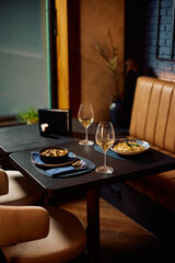 Table setting in a restaurant without people.