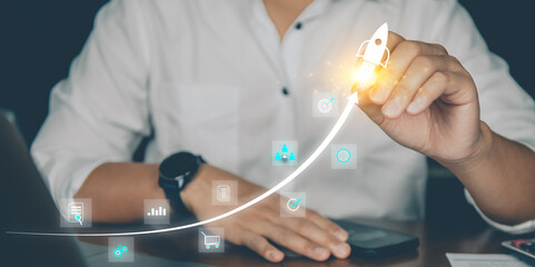 A businessman in white shirt interacts with futuristic digital icons showing analytics, communication, and rising financial performance graph.