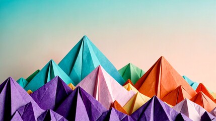 Vibrant geometric origami mountains create a colorful, playful abstract landscape for creative projects