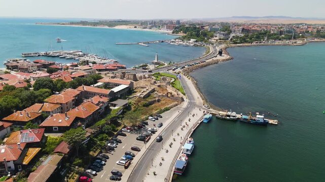 Old houses and churches in old city of Nessebar near city in Bulgaria. Drone view from above. Summer holidays destination

