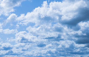 very cloudy sky with blue and white
