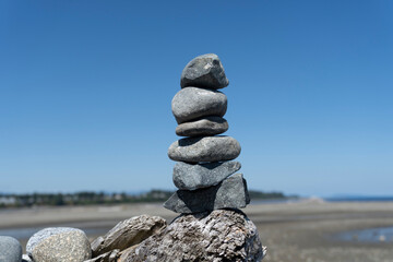 Inukshuk stacked on a sunny summer's day