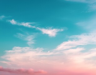 Fototapeta premium a soft pastel pink and teal sky with a few wispy white clouds