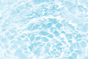 Blue water with ripples on the surface. Defocus blurred transparent blue colored clear calm water...