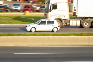 Urban Momentum: Compact Car in the Fast Lane