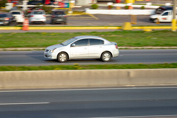 Highway Rhythm: Car in Full Flow
