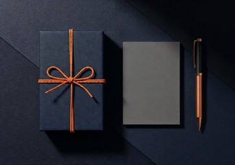 "A sophisticated and luxurious top-down flat lay. A dark navy blue, textured gift box, elegantly tied with an orange string bow, is placed next to a blank grey card and a premium black and copper pen.