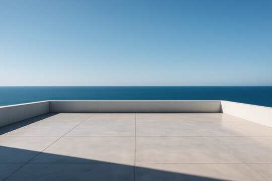 Minimal seafront plaza with empty concrete floor low parapet and infinite ocean horizon under clear blue sky architectural backdrop